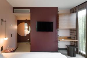 TV o dispositivi per l'intrattenimento presso EmiLu Design Hotel