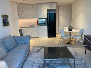 Area soggiorno di ADDRESS BEACH Residence