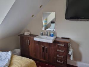 Postel nebo postele na pokoji v ubytování St Leonards Guest House