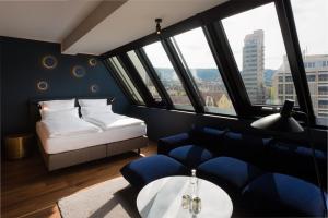 Postel nebo postele na pokoji v ubytování EmiLu Design Hotel + 37 fotografií