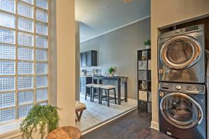 a kitchen with a washer and dryer in a room at Chic Baltimore Apartment 2 Mi to Downtown! in Baltimore