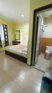 Koupelna v ubytování Ria Cameron Hotel