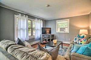 a living room with a couch and a tv at Family-Friendly Tisbury Escape - Walk to Town in Vineyard Haven