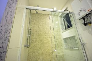 Ванная комната в Rio Spot Homes Flat C033A +23 фотографии