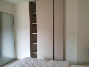 Posteľ alebo postele v izbe v ubytovaní Apartamenty Doliny