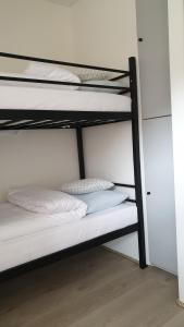 Posteľ alebo postele v izbe v ubytovaní Apartamenty Doliny