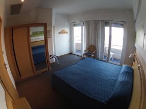 Postel nebo postele na pokoji v ubytování City Hotel