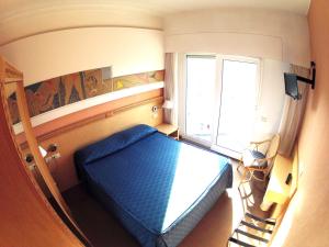 Postel nebo postele na pokoji v ubytování City Hotel