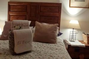 Кровать или кровати в номере Casa Rural el Pajar de Tenzuela