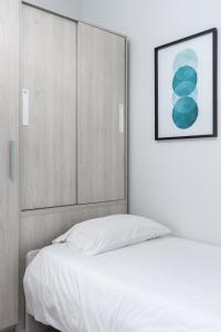 Posteľ alebo postele v izbe v ubytovaní AoA Green Gardens Suites