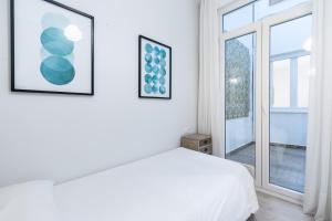 Posteľ alebo postele v izbe v ubytovaní AoA Green Gardens Suites