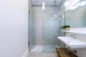 Kúpeľňa v ubytovaní AoA Green Gardens Suites