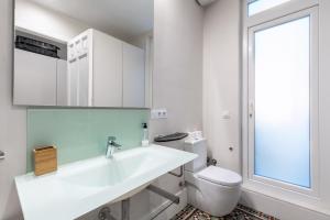 Kúpeľňa v ubytovaní AoA Green Gardens Suites