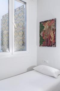 Posteľ alebo postele v izbe v ubytovaní AoA Green Gardens Suites