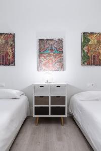 Posteľ alebo postele v izbe v ubytovaní AoA Green Gardens Suites