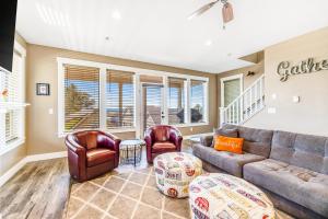 a living room with a couch and chairs at Driftwood Star in Lincoln City