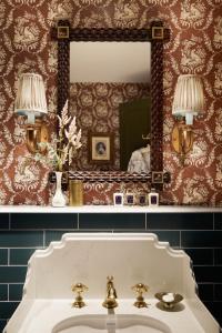 a bathroom with a white sink and a mirror at Rusacks St Andrews in St. Andrews