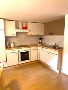 A kitchen or kitchenette at Waldruhe Appartements