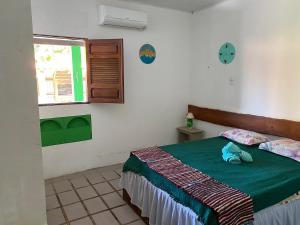 Japaraiso I Casa Azul - Próxima ao Mar 객실 침대