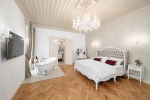 Posteľ alebo postele v izbe v ubytovaní Hotel & Restaurant Chateau Trnová