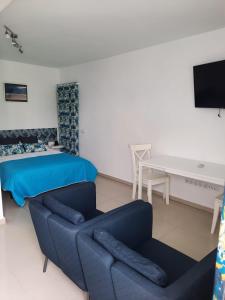 Vivienda Vacacional Casa Lina的电视和/或娱乐中心