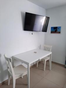 Vivienda Vacacional Casa Lina的电视和/或娱乐中心