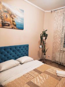 Gulta vai gultas numurā naktsmītnē Lviv's Prospekt Shevchenka Apartments