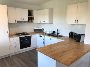 Kuchyň nebo kuchyňský kout v ubytování Derby Digs Cottage