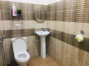 Vonios kambarys apgyvendinimo įstaigoje Danial Homestay Ajil