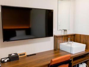 TV a/nebo společenská místnost v ubytování Hotel Wing International Takamatsu