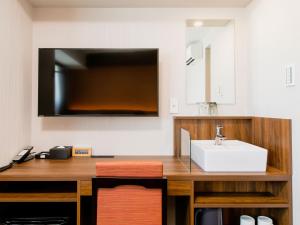 TV a/nebo společenská místnost v ubytování Hotel Wing International Takamatsu