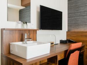 TV a/nebo společenská místnost v ubytování Hotel Wing International Takamatsu