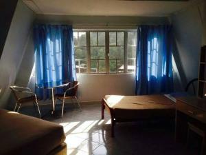Posezení v ubytování Ria Cameron Hotel