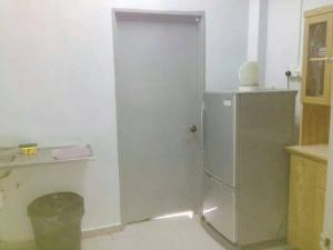Kuchyň nebo kuchyňský kout v ubytování Ria Cameron Hotel