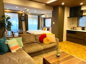 Χώρος καθιστικού στο TABISAI HOTEL Suite 博多