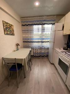 A cozinha ou kitchenette de Apartments 17a quarter, 28