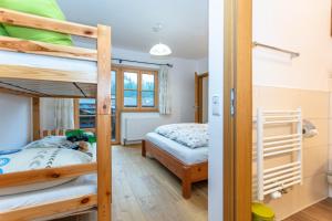 Двуетажно легло или двуетажни легла в стая в Ferienwohnungen Weberbauer