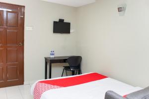 Postelja oz. postelje v sobi nastanitve OYO 90338 Prima Saujana Budget Hotel