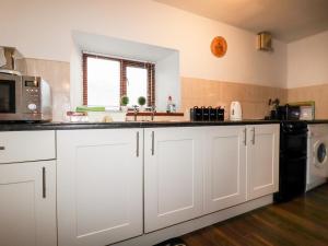Küche/Küchenzeile in der Unterkunft Hedgehog Cottage