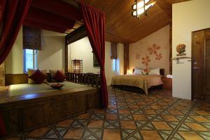 Postel nebo postele na pokoji v ubytování Cloudenjoy B&B