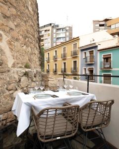 
a table that has a basket on it at Pou by Vilamassalia Only Adults in Villajoyosa
