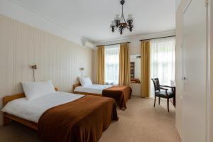 Postel nebo postele na pokoji v ubytování Verevi Motel