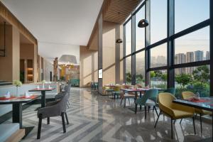 En restaurang eller annat matställe på Holiday Inn Luzhou Longjian, an IHG Hotel