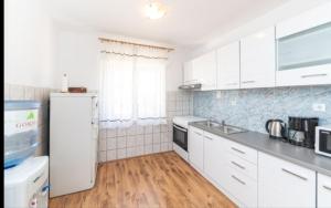 Ett kök eller pentry på Apartman Marinović