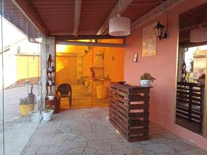 a room with a patio with a table and a building at Casa Rosalía in Silleda