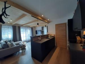 Posedenie v ubytovaní Hochalmbahnen Chalets Rauris 1-10 WE1, Maislaufeldweg 1j EG
