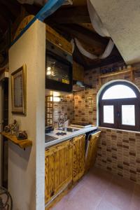 Kuchyň nebo kuchyňský kout v ubytování Holiday Home Lazuština Paradise