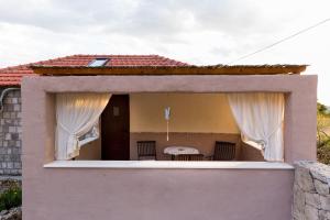 Balkón nebo terasa v ubytování Holiday Home Lazuština Paradise