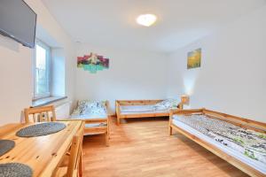 Posteľ alebo postele v izbe v ubytovaní Bieszczadówka