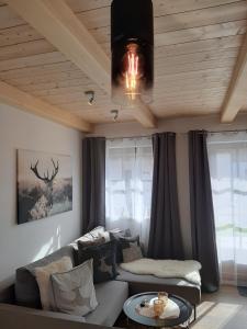 Posedenie v ubytovaní Hochalmbahnen Chalets Rauris 1-10 WE1, Maislaufeldweg 1j EG